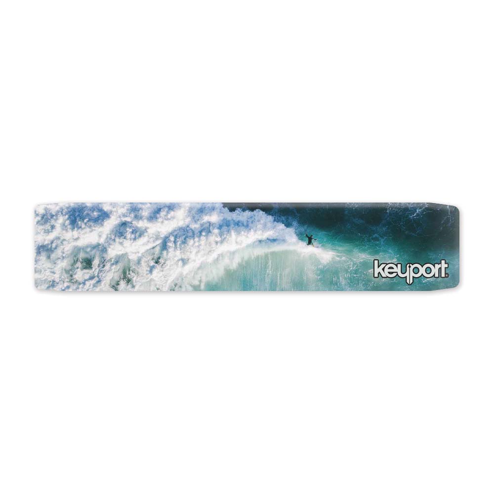 Keyport Faceplate featuring a surfboard design with waves